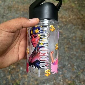 Clear Water Bottle with Black Lid and Glasses with straw and lid